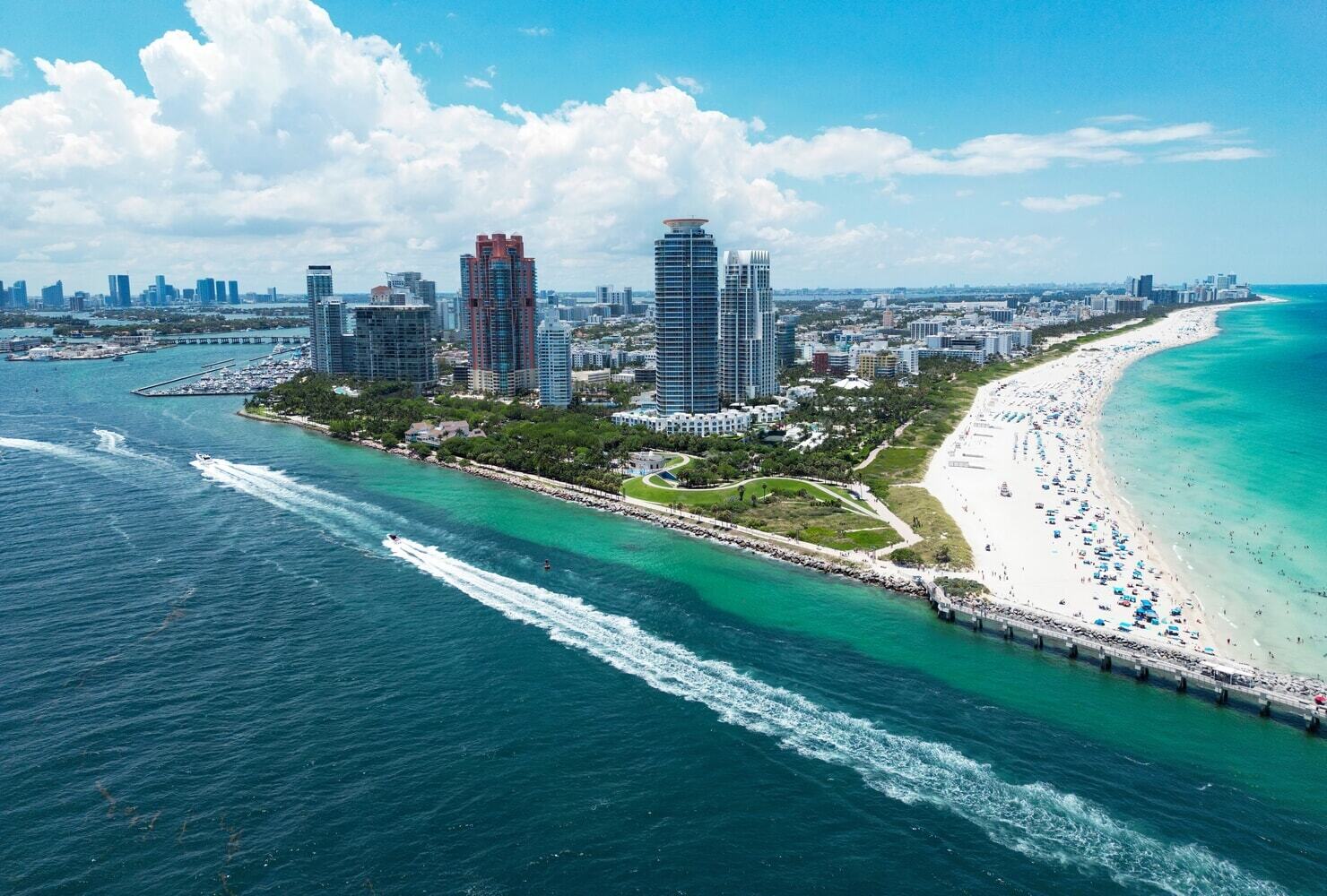 Aerial view of South of Fifth Miami Beach neighborhood with white sand beach and turquoise ocean