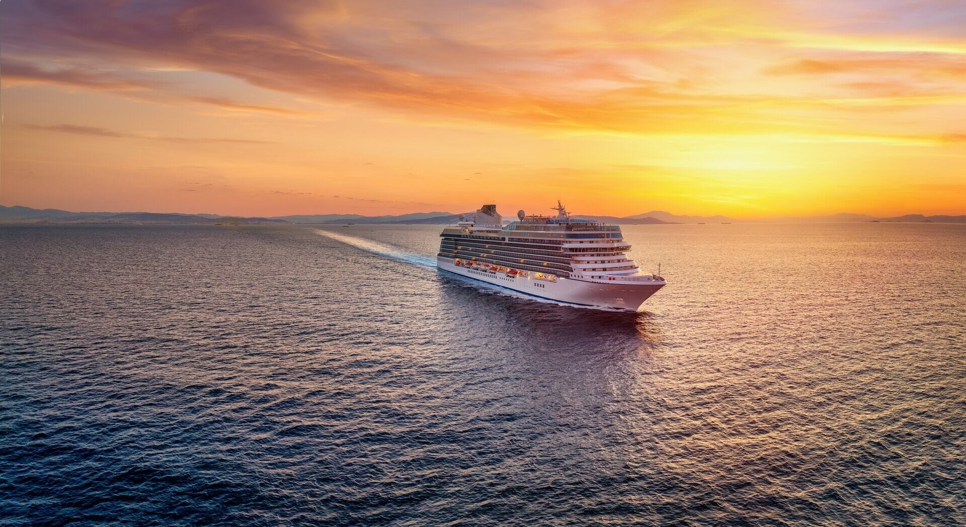 Luxury cruise ship docked in Miami with clear blue skies and ocean views.