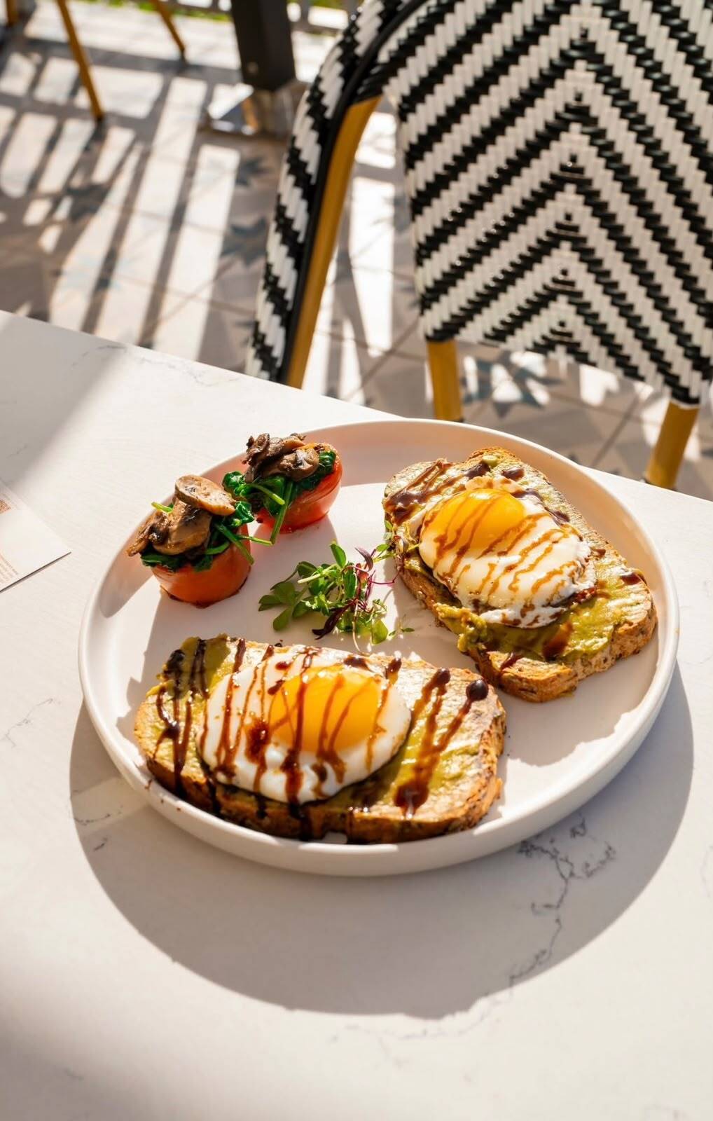 Avocado toast with poached egg at Bon Bouquet Cafe, Upsun Hotel