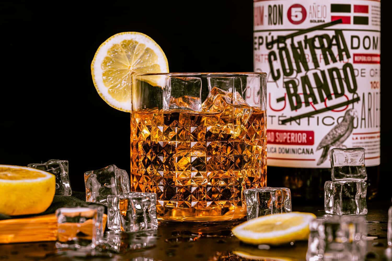 A picture of rum in a glass full of ice